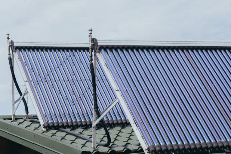 The collector for heating water from solar energy is placed on the roof of the house